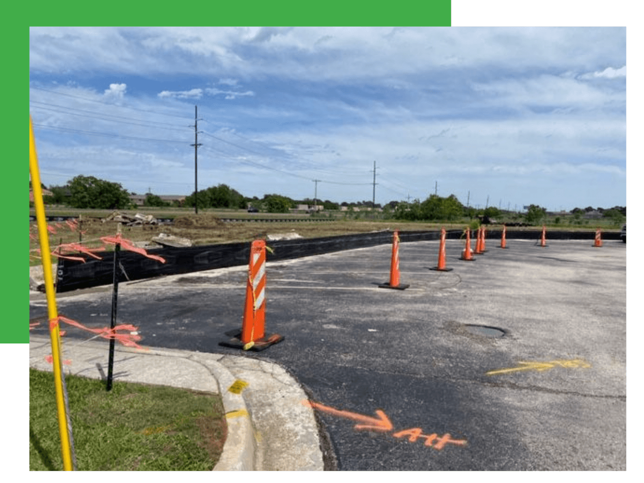 Freshly paved smooth black asphalt parking lot after reclamation